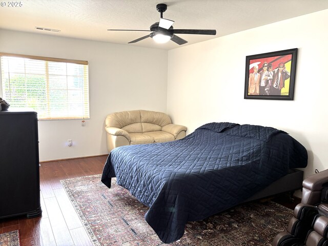 17239 Lumberview Rd, Brookings, OR 97415 - bedroom featuring wood finished floors and ceiling fan