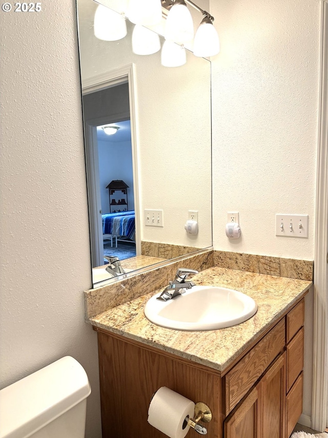 17239 Lumberview Rd, Brookings, OR 97415 - ensuite bathroom featuring toilet and vanity