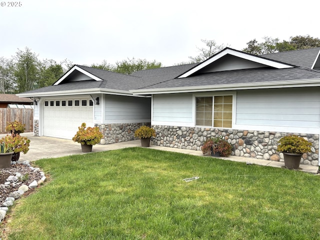 17239 Lumberview Rd, Brookings, OR 97415 - ranch-style house with a shingled roof, a garage, stone siding, and concrete driveway