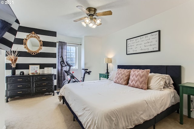 bedroom with light carpet and ceiling fan