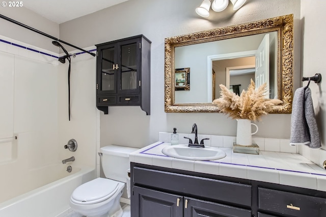 full bathroom with shower / bathing tub combination, vanity, and toilet