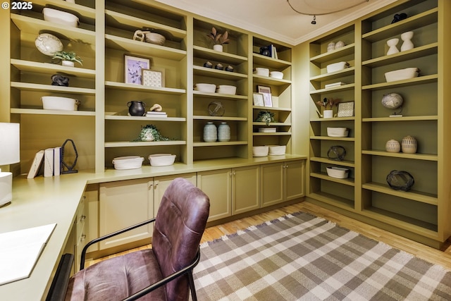 office with a sink and light wood-style floors