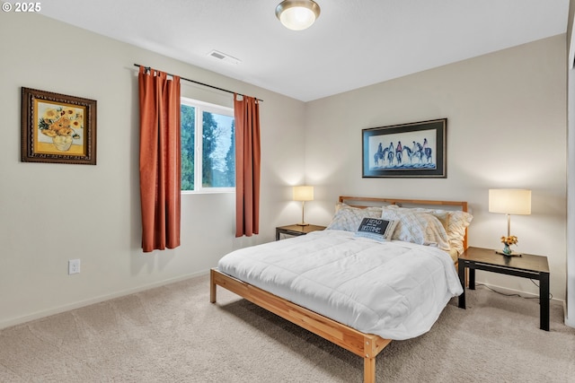 bedroom featuring carpet, visible vents, and baseboards