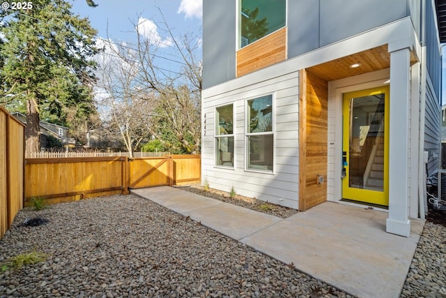 exterior space featuring a patio and fence