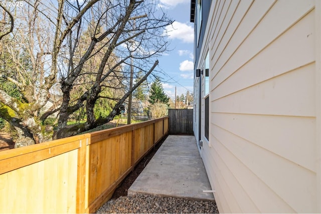 view of property exterior with fence