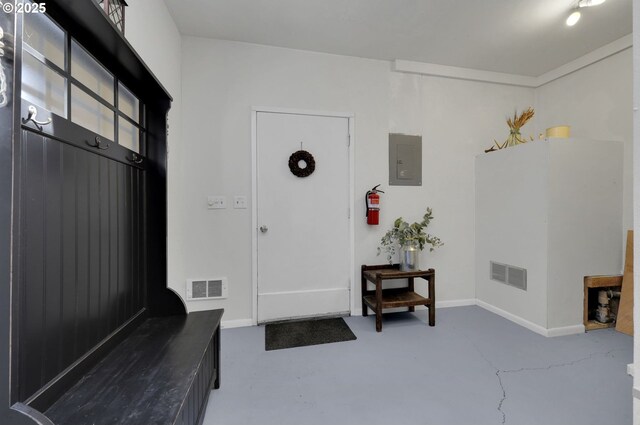 91760 Horse Creek Rd, Mckenzie Bridge, OR 97413 - mudroom with finished concrete flooring, electric panel, and baseboards
