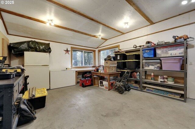 91760 Horse Creek Rd, Mckenzie Bridge, OR 97413 - below grade area featuring freestanding refrigerator, a workshop area, and fridge