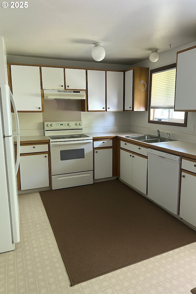 6100 NE 55th Cir, Vancouver, WA 98661 - kitchen with white appliances, under cabinet range hood, light countertops, and tile patterned floors