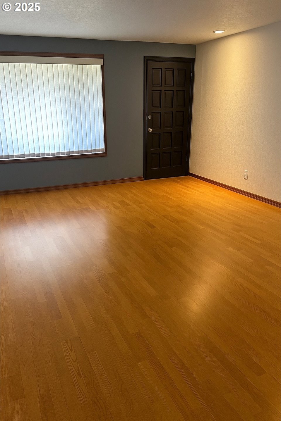 6100 NE 55th Cir, Vancouver, WA 98661 - empty room featuring light wood finished floors and baseboards