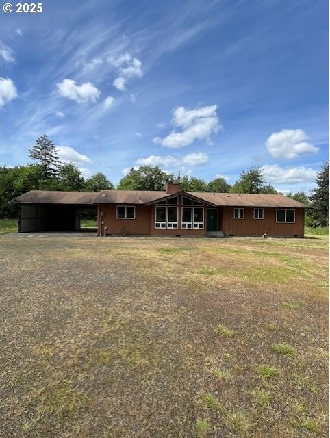 73927 Alder Grove Rd, Clatskanie, OR 97016 - back of house featuring a carport