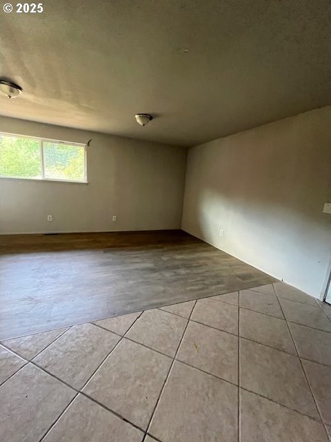 73927 Alder Grove Rd, Clatskanie, OR 97016 - spare room featuring tile patterned floors