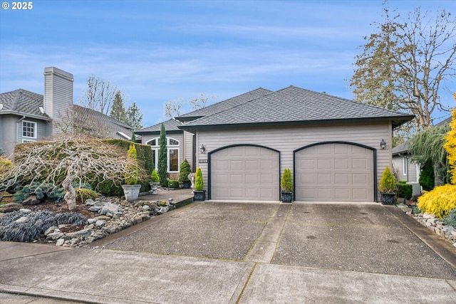 ranch-style home with a garage