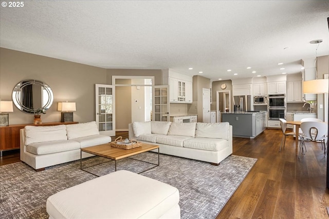 4679 Dogwood Dr, Lake Oswego, OR 97035 - living room with a textured ceiling, dark wood-style floors, and recessed lighting