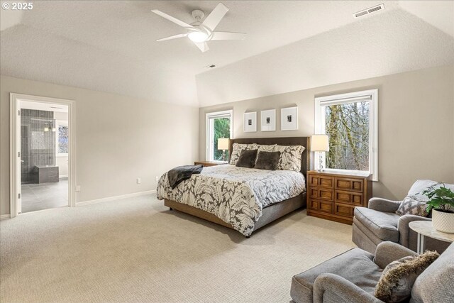 4679 Dogwood Dr, Lake Oswego, OR 97035 - bedroom with multiple windows, light carpet, vaulted ceiling, a ceiling fan, and ensuite bathroom