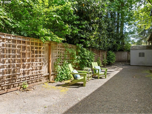 4679 Dogwood Dr, Lake Oswego, OR 97035 - fenced backyard with an outbuilding and a shed