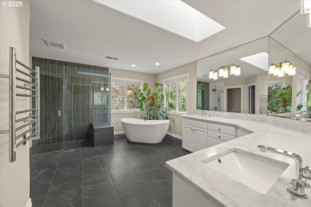 4679 Dogwood Dr, Lake Oswego, OR 97035 - bathroom with a stall shower, a soaking tub, marble look tiles, vanity, and recessed lighting