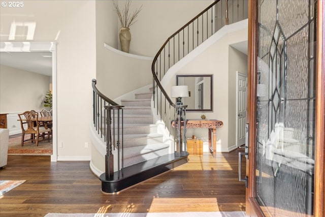4679 Dogwood Dr, Lake Oswego, OR 97035 - entrance foyer featuring wood finished floors, stairs, a towering ceiling, and baseboards