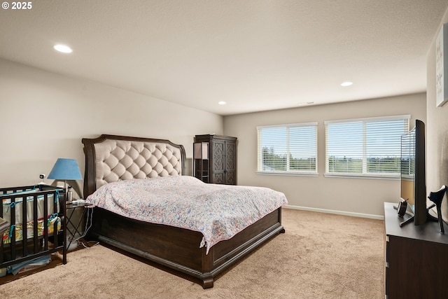 carpeted bedroom with baseboards and recessed lighting