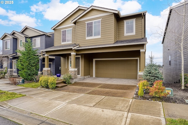 craftsman inspired home with concrete driveway and a garage