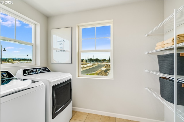 966 Legacy Ln, Eugene, OR 97402 - washroom with independent washer and dryer and light tile patterned flooring