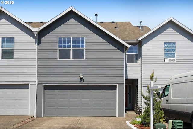 17881 SW Pars Pl, Beaverton, OR 97078 - view of side of home with a garage and driveway