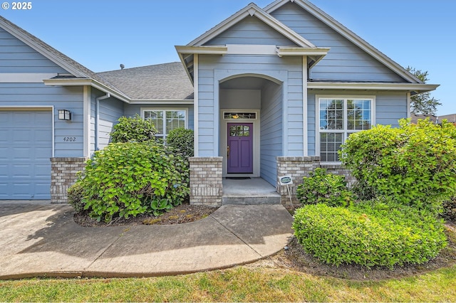 4202 SE 31st St, Gresham, OR 97080 - entrance to property featuring brick siding, a shingled roof, and a garage