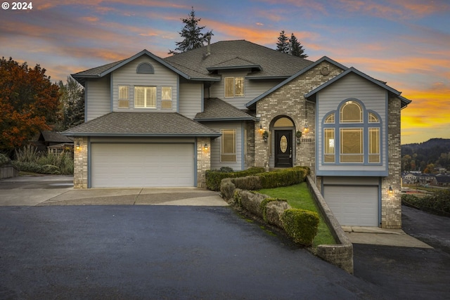 view of front of property with a garage