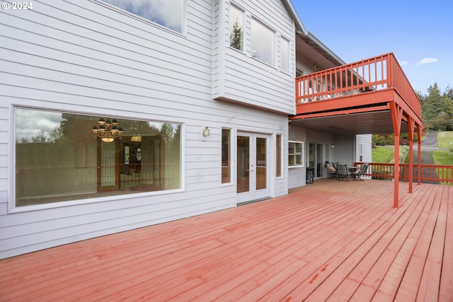 wooden terrace featuring french doors