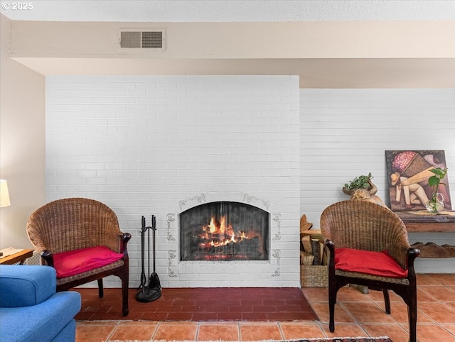 8512 SW Brightfield Cir, Tigard, OR 97223 - living area with tile patterned floors and a fireplace