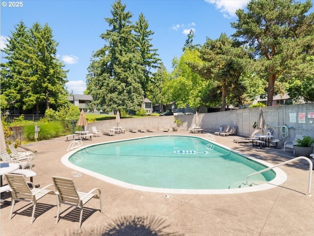 8512 SW Brightfield Cir, Tigard, OR 97223 - community pool featuring a patio area