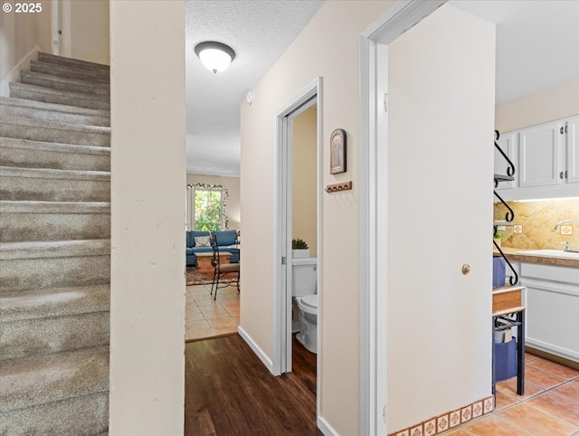 8512 SW Brightfield Cir, Tigard, OR 97223 - staircase with wood finished floors