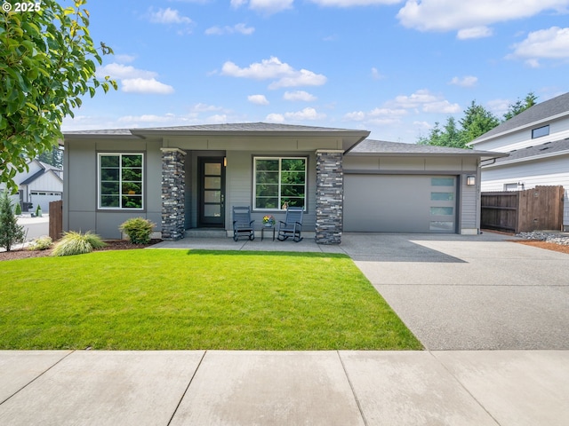 16711 NE 86th St, Vancouver, WA 98682 - view of front of property with an attached garage, driveway, a porch, and stone siding
