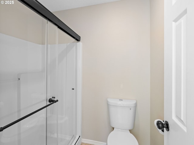 12576 NW Maplecrest Way, Banks, OR 97106 - bathroom with a shower stall and toilet