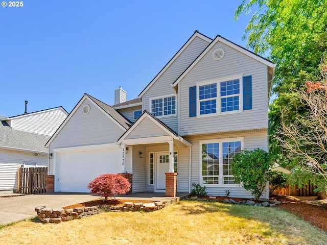 12576 NW Maplecrest Way, Banks, OR 97106 - view of front of home with driveway and an attached garage