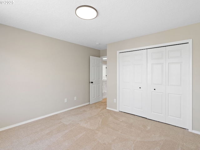 12576 NW Maplecrest Way, Banks, OR 97106 - unfurnished bedroom with carpet flooring and a closet