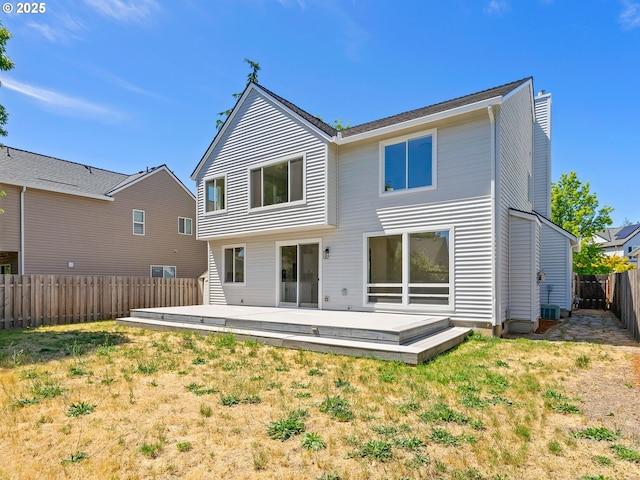 12576 NW Maplecrest Way, Banks, OR 97106 - rear view of property featuring a fenced backyard and a wooden deck