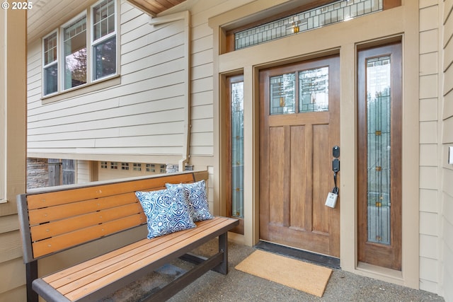 doorway to property with a porch