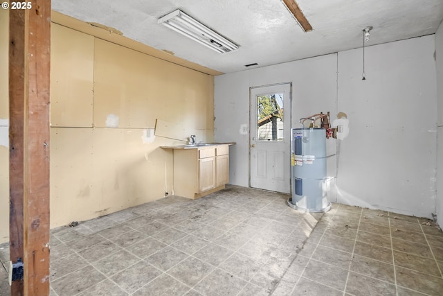 interior space featuring electric water heater and visible vents