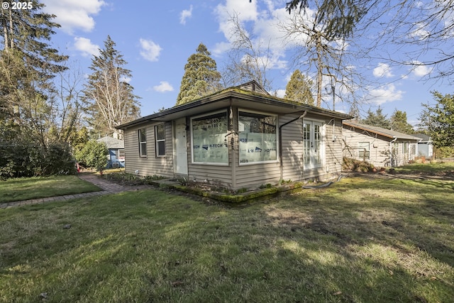 view of front of home with a front yard