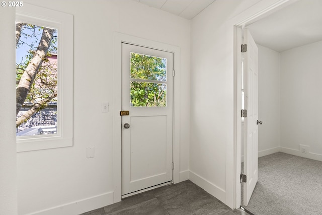 doorway with baseboards
