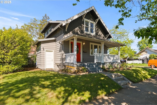 view of front of property with covered porch and a front yard