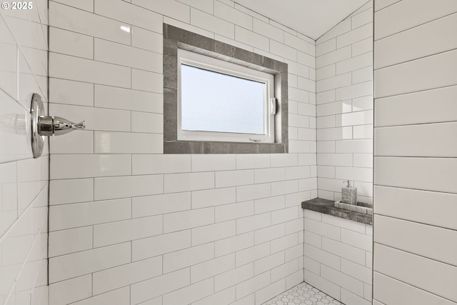 full bath featuring tiled shower