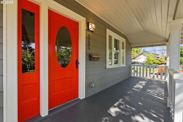 entrance to property with a porch