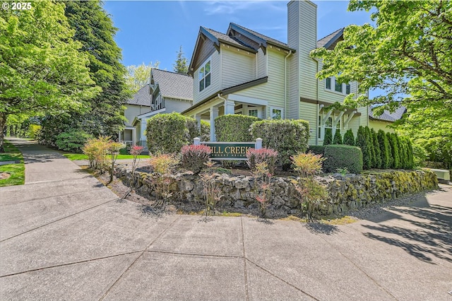 view of home's exterior featuring a chimney