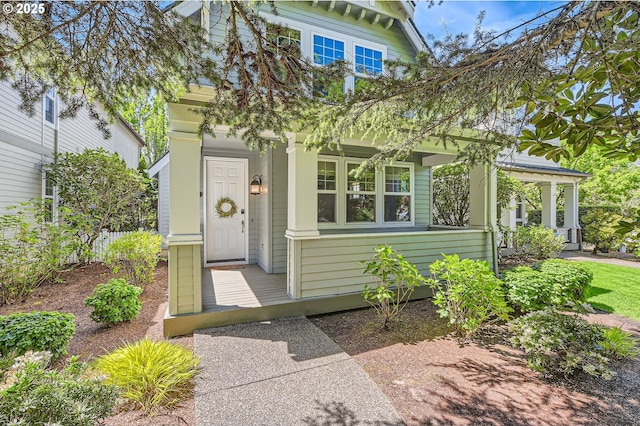 view of front of property featuring covered porch