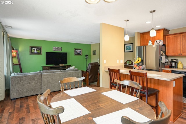 dining area with dark wood-type flooring