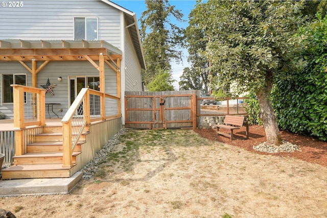 view of yard with a wooden deck