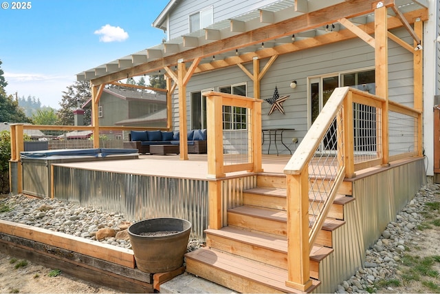 wooden deck featuring an outdoor hangout area