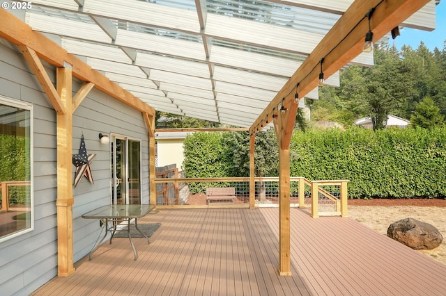 wooden deck with a pergola