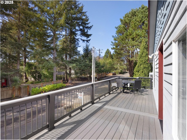 370 4th Pl, Manzanita, OR 97130 - wooden deck with outdoor dining area